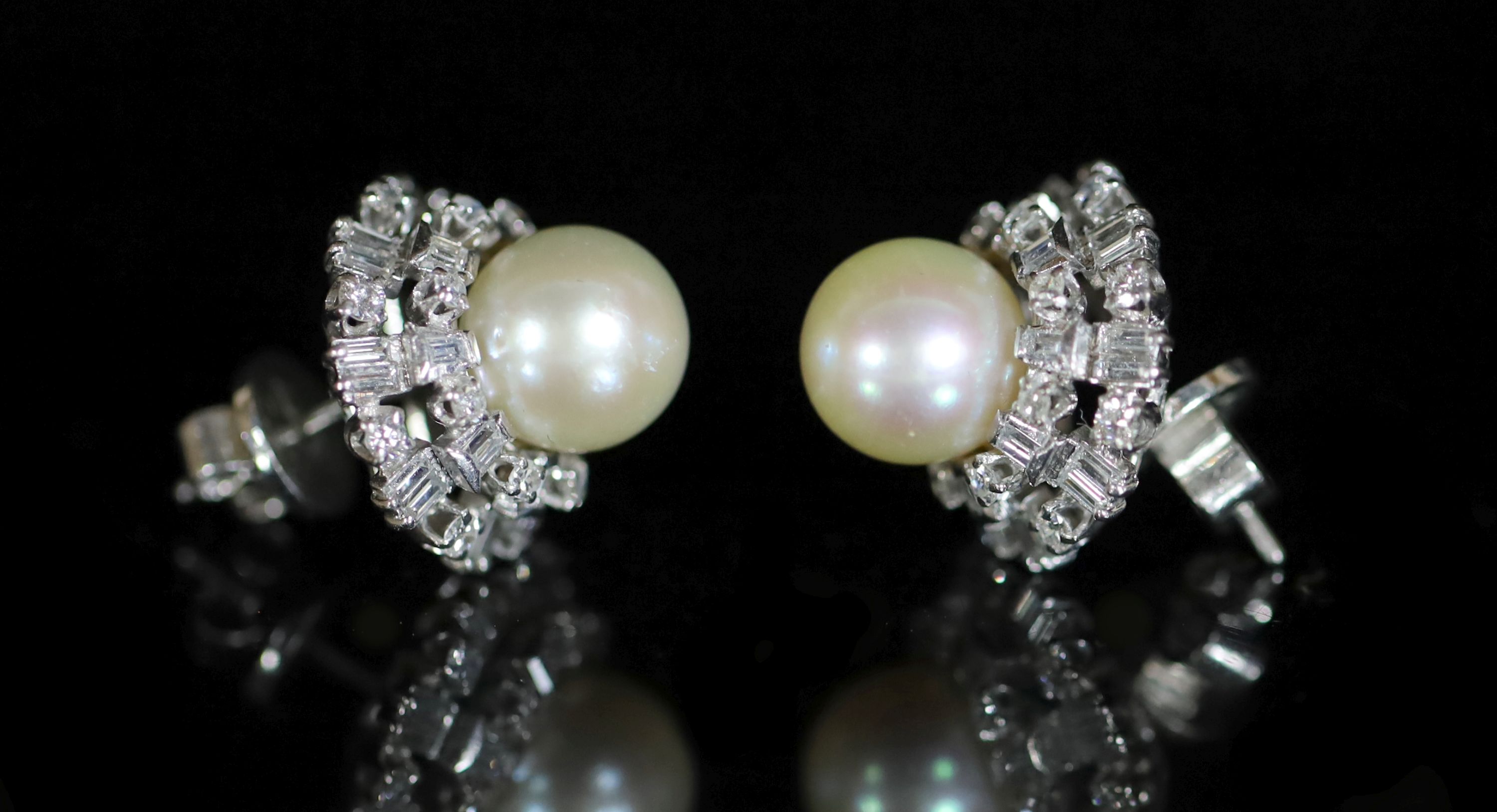 A pair of 14ct gold (585) cultured pearl and diamond set circular cluster stud earrings,